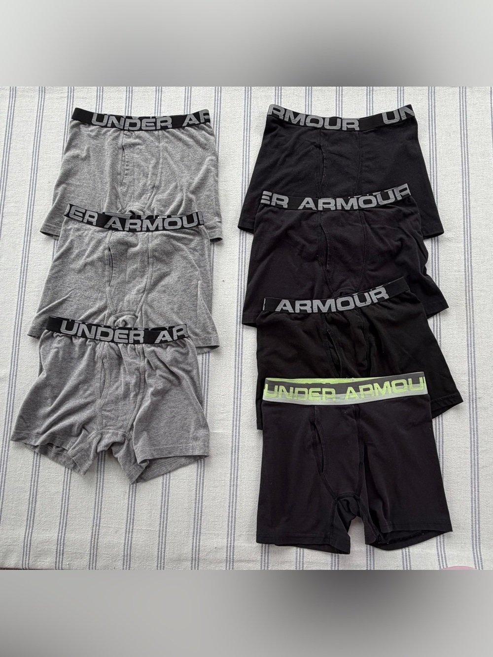 7 pairs of medium UA boxer briefs